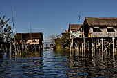 Inle Lake Myanmar. All the buildings are constructed on piles. Residents travel around by canoe, but there are also bamboo walkways and bridges over the canals, monasteries and stupas. 